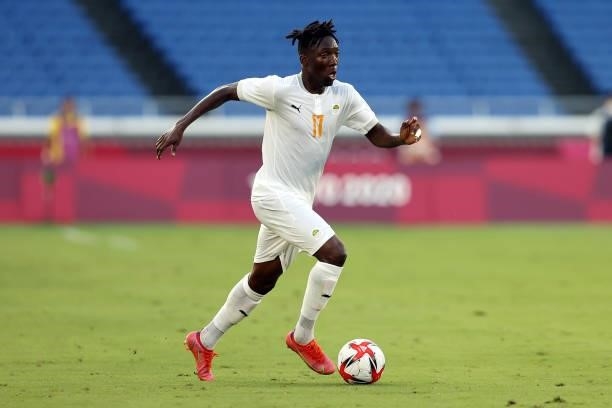 Zie Ouattara of Team Ivory Coast runs with the ball during the Men's First Round Group D match between Brazil and Cote d'Ivoire on day two of the...