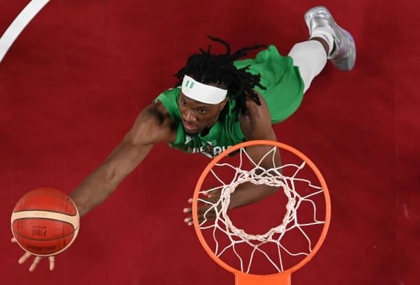 Precious Achiuwa of Team Nigeria grabs a rebound against Team Australia in the first half of the Men's Preliminary Round Group B game on day two of...