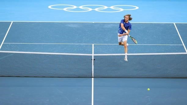 Stefanos Tsitsipas of Team Greece plays a smash during his Men's Singles First Round match against Philipp Kohlschreiber of Team Germany on day two...
