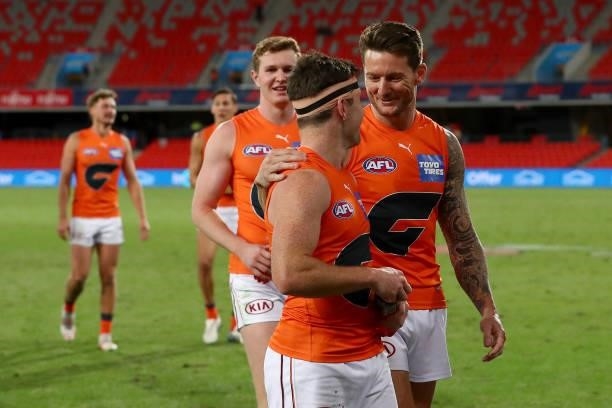 Daniel Lloyd of the GWS Giants celebrates the win during the round 19 AFL match between Essendon Bombers and Greater Western Sydney Giants at...