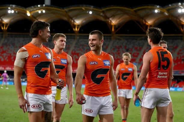 Daniel Lloyd of the GWS Giants celebrates after the win during the round 19 AFL match between Essendon Bombers and Greater Western Sydney Giants at...