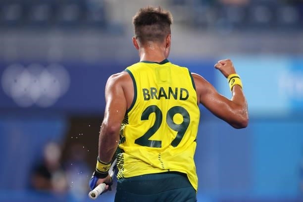 Tim Brand of Team Australia celebrates after scoring their team's seventh goal during the Men's Preliminary Pool A match between India and Australia...