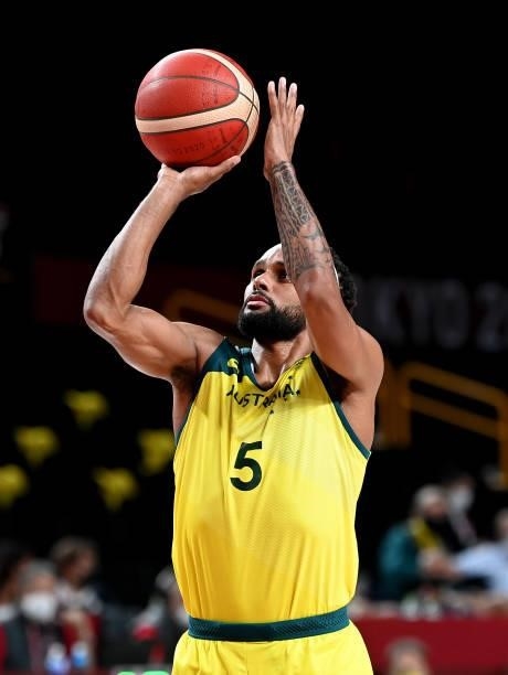 Patty Mills of Australia shoots during the preliminary rounds of the Men's Basketball match between Australia and Nigeria on day two of the Tokyo...