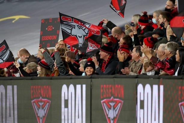 Essendon fans show support during the round 19 AFL match between Essendon Bombers and Greater Western Sydney Giants at Metricon Stadium on July 25,...