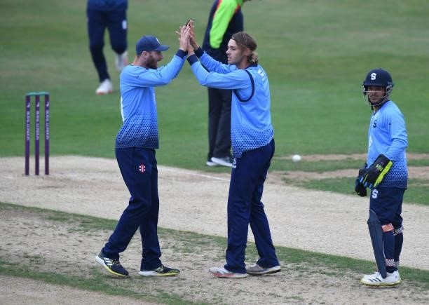 Freddie Heldreich of Northamptonshire celebrates taking the wicket of Nick Selman of Glamorgan bats during the Royal London Cup match between...