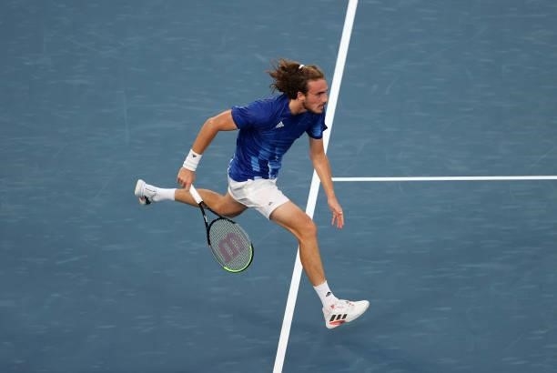 Stefanos Tsitsipas of Team Greece chases a return during his Men's Singles First Round match against Philipp Kohlschreiber of Team Germany on day two...
