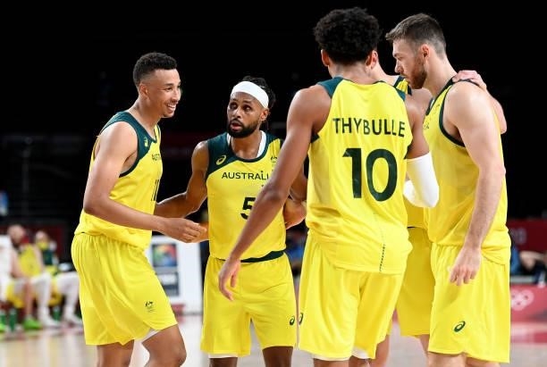 The Australian team embrace during the preliminary rounds of the Men's Basketball match between Australia and Nigeria on day two of the Tokyo 2020...