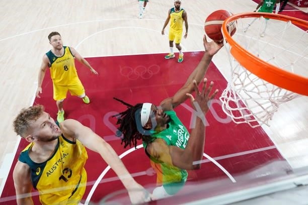 Precious Achiuwa of Team Nigeria drives to the basket against Jock Landale of Team Australia during the second half of Men's Preliminary Round Group...