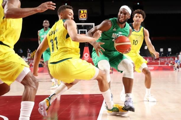 Josh Okogie of Team Nigeria drives to the basket against Dante Exum of Team Australia in the second half of the Men's Preliminary Round Group B game...