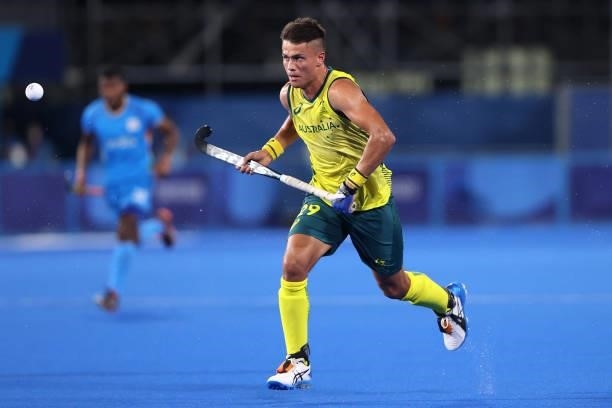 Tim Brand of Team Australia runs towards the ball on their way to scoring their team's seventh goal during the Men's Preliminary Pool A match between...