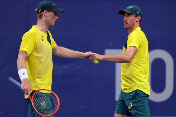John Millman of Team Australia and Luke Saville of Team Australia during their Men's Doubles First Round match on day two of the Tokyo 2020 Olympic...