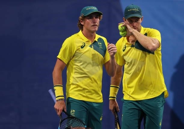 John Peers of Team Australia and Max Purcell of Team Australia during their Men's Doubles First Round match against Tennys Sandgren of Team USA and...
