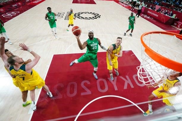 Josh Okogie of Team Nigeria drives into the lane and takes a shot against Team Australia in the second half of the Men's Preliminary Round Group B...