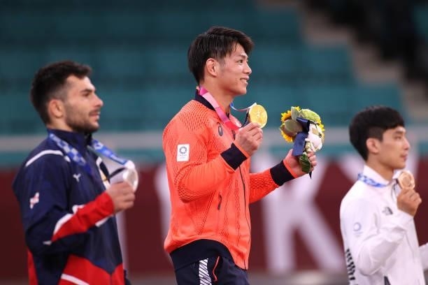 Hifumi Abe of Team Japan poses with the gold medal for the Men’s Judo 66kg event on day two of the Tokyo 2020 Olympic Games at Nippon Budokan on July...