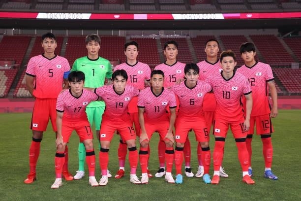 Players of Team South Korea pose for a team photograph prior to the Men's First Round Group B match between Romania and Republic of Korea on day two...