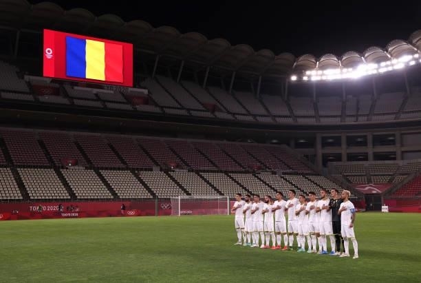 Players of Team Romania stand for the national anthem prior to the Men's First Round Group B match between Romania and Republic of Korea on day two...