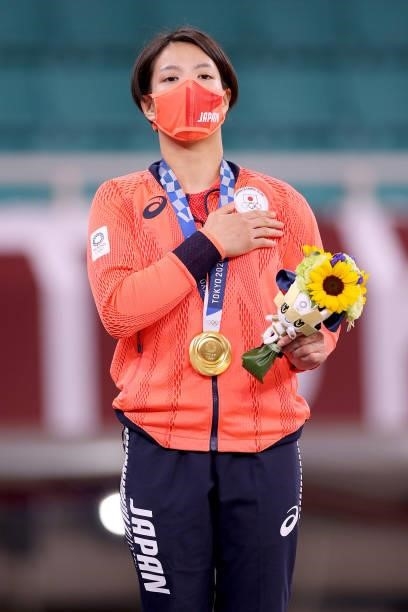 Uta Abe of Team Japan poses with the gold medal for the Women’s Judo 52kg Final on day two of the Tokyo 2020 Olympic Games at Nippon Budokan on July...