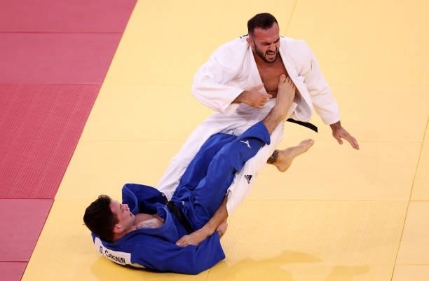 Daniel Cargnin of Team Brazil and Baruch Shmailov of Team Israel compete during the Men’s Judo 66kg Contest for Bronze Medal B on day two of the...