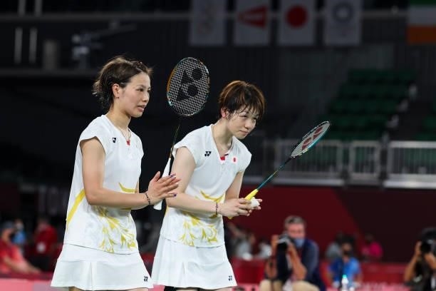 Yuki Fukushima and Sayaka Hirota of Team Japan react as they win against Chow Mei Kuan and Lee Meng Yean of Team Malaysia during a Women's Doubles...