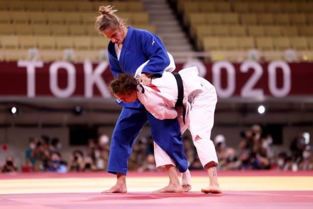 Chelsie Giles of Team Great Britain and Charlie van Snick of Team Belgium compete during the Women’s 52kg Judo Repechage contest on day two of the...