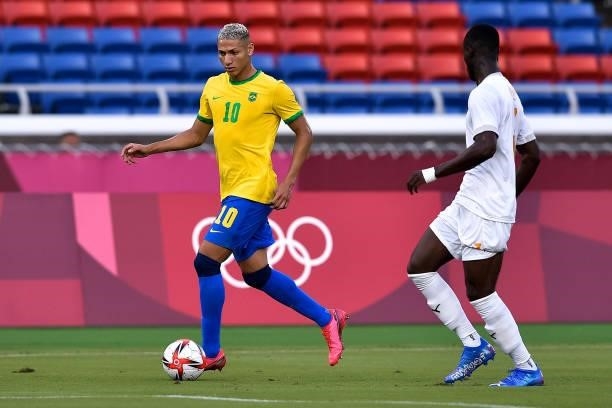 Richarlison of Brazil and Eric Bailly of Ivory Coast during the Tokyo 2020 Olympic Mens Football Tournament match between Brazil and Ivory Coast at...