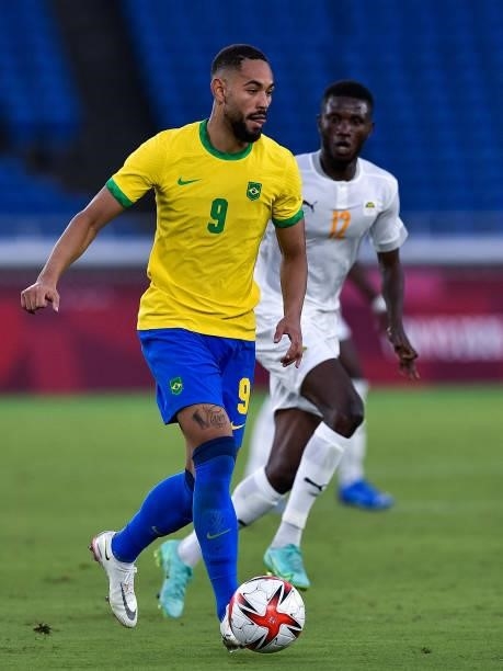 Matheus Cunha of Brazil and Eboue Kouassi of Ivory Coast during the Tokyo 2020 Olympic Mens Football Tournament match between Brazil and Ivory Coast...