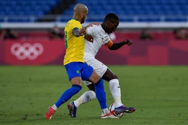 Dani Alves of Brazil and Max Gradel of Ivory Coast during the Tokyo 2020 Olympic Mens Football Tournament match between Brazil and Ivory Coast at...