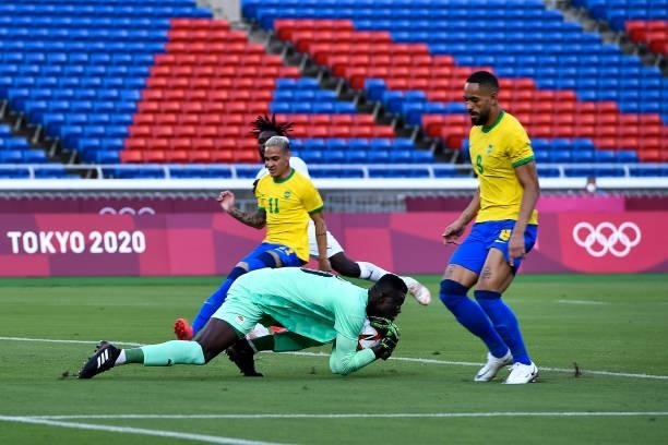Tape Ira of Ivory Coast makes a save during the Tokyo 2020 Olympic Mens Football Tournament match between Brazil and Ivory Coast at Nissan Stadium on...