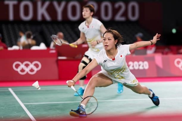 Yuki Fukushima and Sayaka Hirota of Team Japan compete against Chow Mei Kuan and Lee Meng Yean of Team Malaysia during a Women's Doubles Group A...