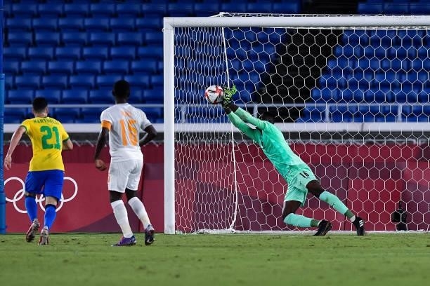 Tape Ira of Ivory Coast makes a save during the Tokyo 2020 Olympic Mens Football Tournament match between Brazil and Ivory Coast at Nissan Stadium on...