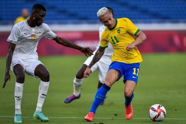 Eboue Kouassi of Ivory Coast and Antony of Brazil during the Tokyo 2020 Olympic Mens Football Tournament match between Brazil and Ivory Coast at...