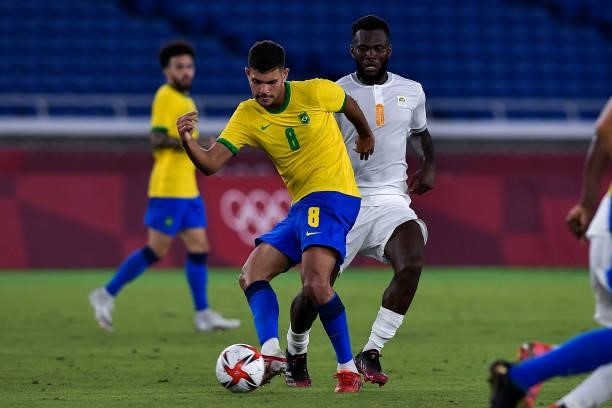 Bruno Guimaraes of Brazil and Franck Kessie of Ivory Coast during the Tokyo 2020 Olympic Mens Football Tournament match between Brazil and Ivory...