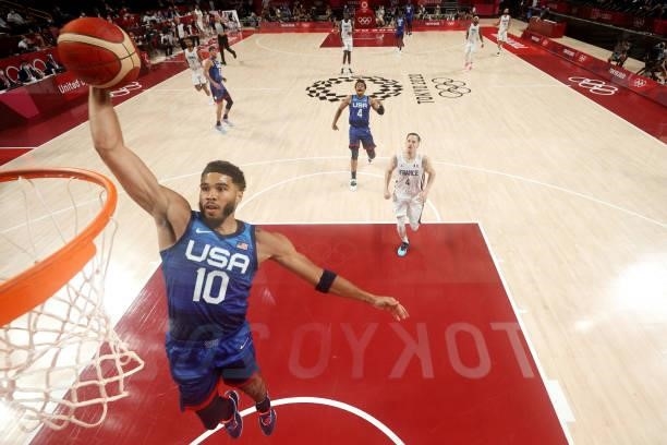 Jayson Tatum of Team United States dunks against Team France during the first half of the Men's Preliminary Round Group B game on day two of the...