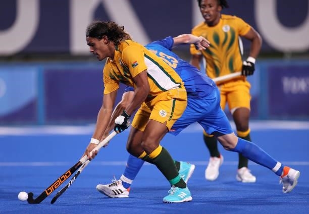 Mustaphaa Cassiem of Team South Africa holds off Joep Paul Eric de Mol of Team Netherlands on their way to scoring their team's first goal during the...