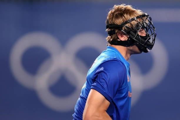 Jip Janssen of Team Netherlands looks on whilst wearing their protective face mask during the Men's Preliminary Pool B match between South Africa and...