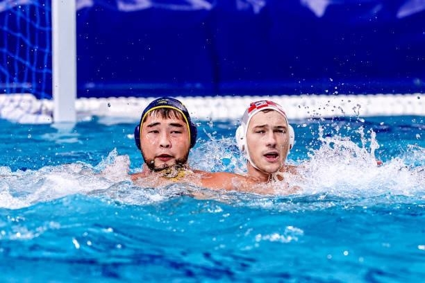 Altay Altayev of Kazakhstan, Luka Bukic of Croatia during the Tokyo 2020 Olympic Waterpolo Tournament Men match between Team Croatia and Team...