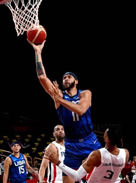 Javale McGee of the USA drives to the basket during the preliminary rounds of the Men's Basketball match between the USA and France on day two of the...