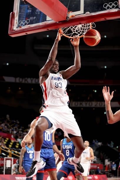 Moustapha Fall of Team France dunks against Team United States of America in the first half of the Men's Preliminary Round Group B game on day two of...