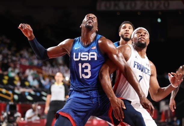 Bam Adebayo of Team United States and Guerschon Yabusele of Team France battle for position during the first half of the Men's Preliminary Round...