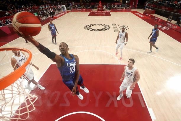 Bam Adebayo of Team United States goes up for a layup against Team France Men's Preliminary Round Group B game on day two of the Tokyo 2020 Olympic...