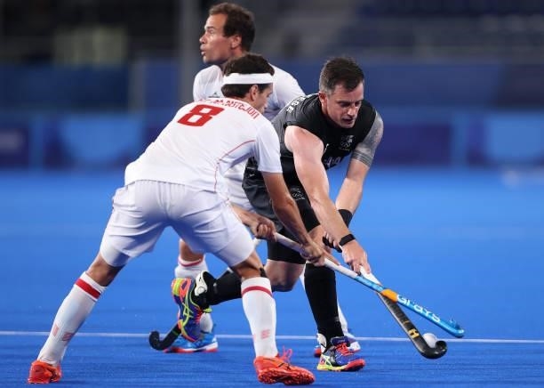 Enrique Gonzalez de Castejon and Alvaro Iglesias Marcos of Team Spain battle for the ball with Shea McAleese of Team New Zealand during the Men's...