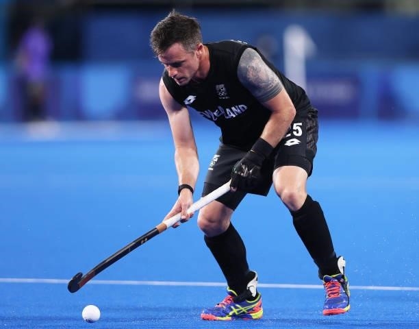 Shea McAleese of Team New Zealand controls the ball during the Men's Preliminary Pool A match between Spain and New Zealand on day two of the Tokyo...