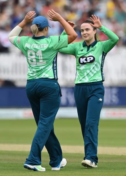 Mady Villiers of Oval Invincibles Women celebrates with captain Dane van Niekerk during The Hundred match between London Spirit Women and Oval...