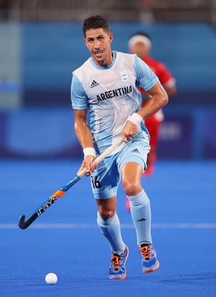 Ignacio Horacio Ortiz of Team Argentina runs with the ball during the Men's Preliminary Pool A match between Japan and Argentina on day two of the...