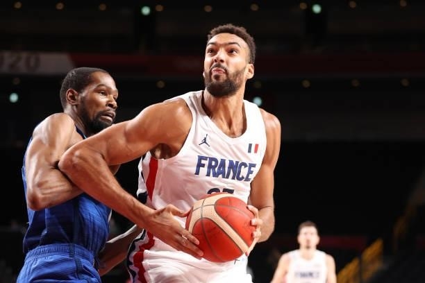 Rudy Gobert of Team France drives past Kevin Durant of Team United States during the first half of the Men's Preliminary Round Group B game on day...