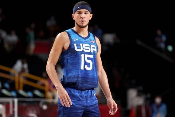 Devin Booker of Team United States looks on during the first half of their Men's Preliminary Round Group B game against Team France on day two of the...