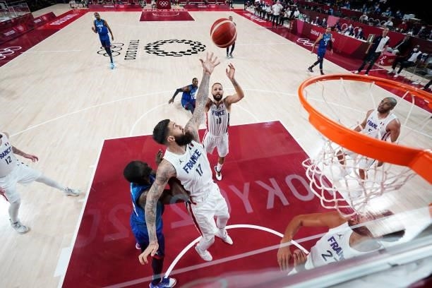 Vincent Poirier of Team France goes up for a rebound against Team United States of America during the first half of the Men's Preliminary Round Group...