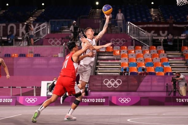 Karlis Lasmanis of Team Latvia drives to the basket during the Men's Pool Round match between Latvia and Japan on day two of the Tokyo 2020 Olympic...