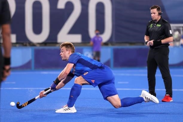 Mink Alphons Louis van der Weerden of Team Netherlands scores their team's fourth goal from a penalty stroke during the Men's Preliminary Pool B...