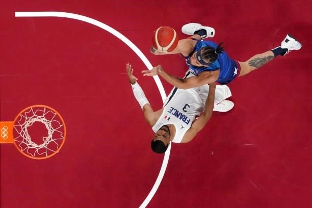 Javale McGee of Team United States drives to the basket against Timothe Luwawu Kongbo of Team France during the first half of the Men's Preliminary...
